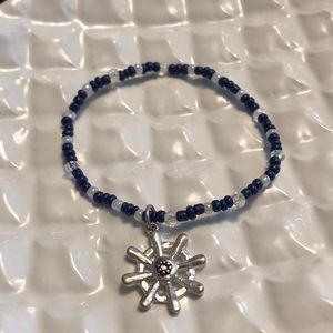 Nautical beaded bracelet with charm.